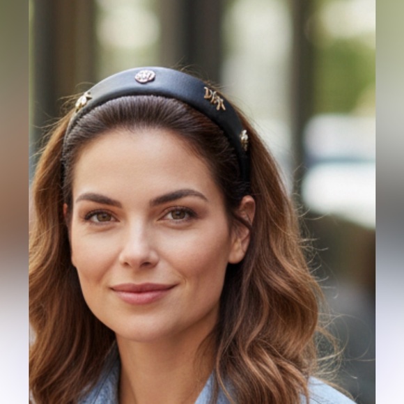 Beautiful black headband with beautiful gold tone logo and floral design. - Picture 2 of 2